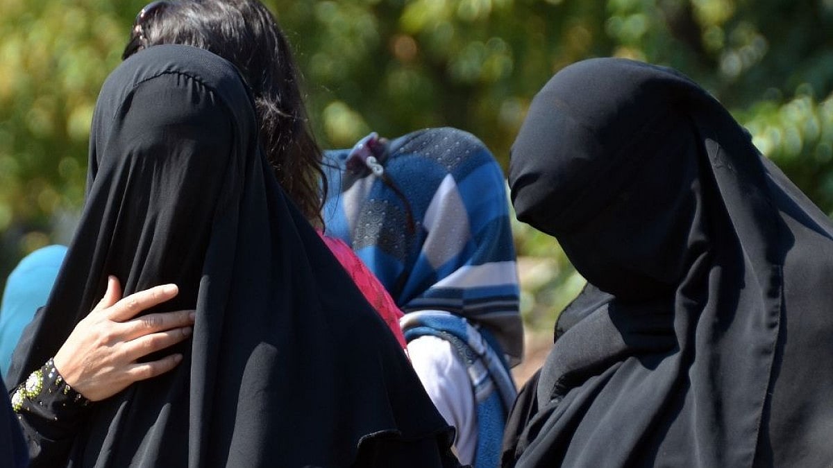 Women in burqa.