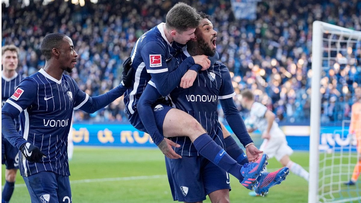 Bochum's Juergen Locadia celebrates after scoring against Bayern Munich in Bundesliga 2021-22.