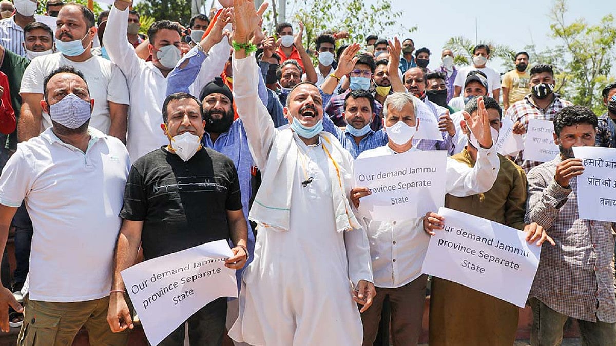 Former MLA Balwant Singh Mankotia along with supporters stages a protest demanding the creation of Jammu as a separate state, in Jammu.