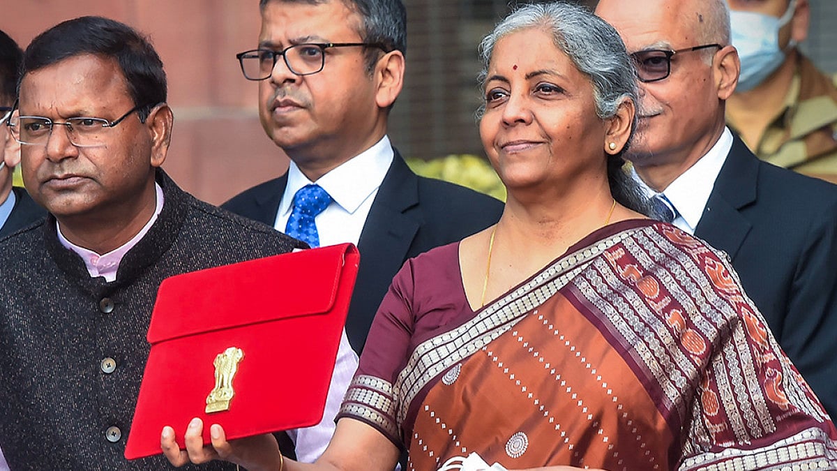 Union Finance Minister Nirmala Sitharaman holds a folder-case containing Budget 2022-23 as leaves fr