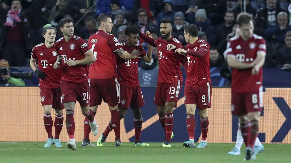 Bayern Munich's Kingsley Coman celebrates with teammates after scoring the opener against Salzburg.