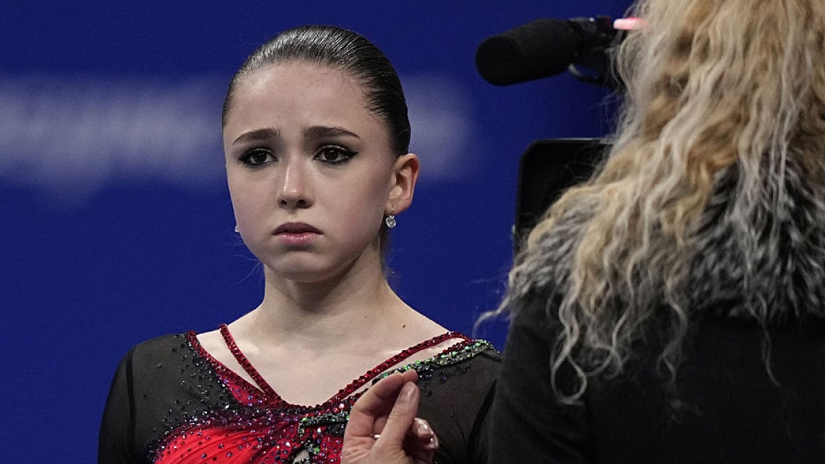 Kamila Valieva reacts after competing in the women's free skate program at the 2022 Winter Olympics.