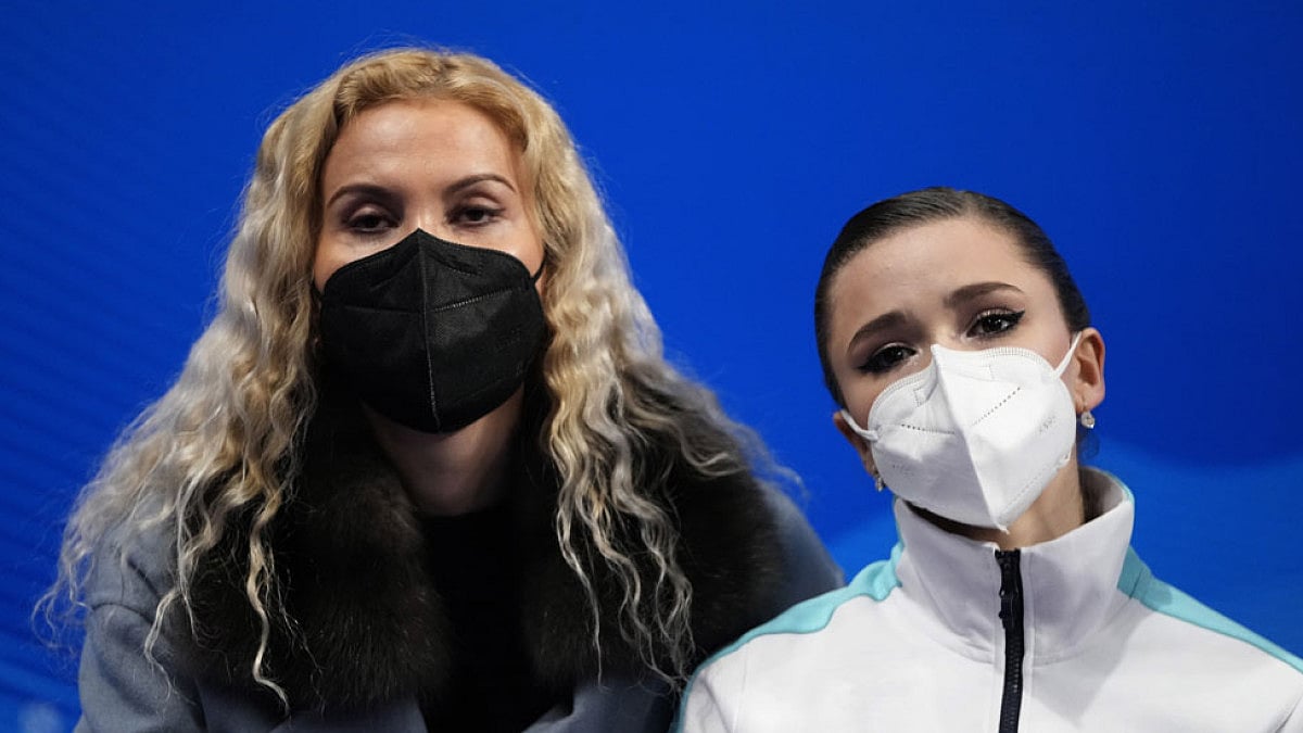 Coach Eteri Tutberidze with skater Kamila Valieva after the short program at the 2022 Winter Games.