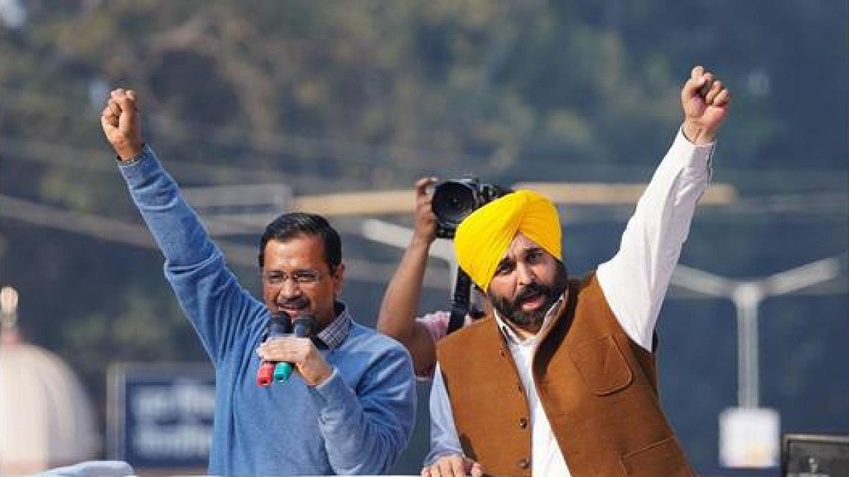 Punjab CM Mann and Arvind Kejriwal   - PTI/File