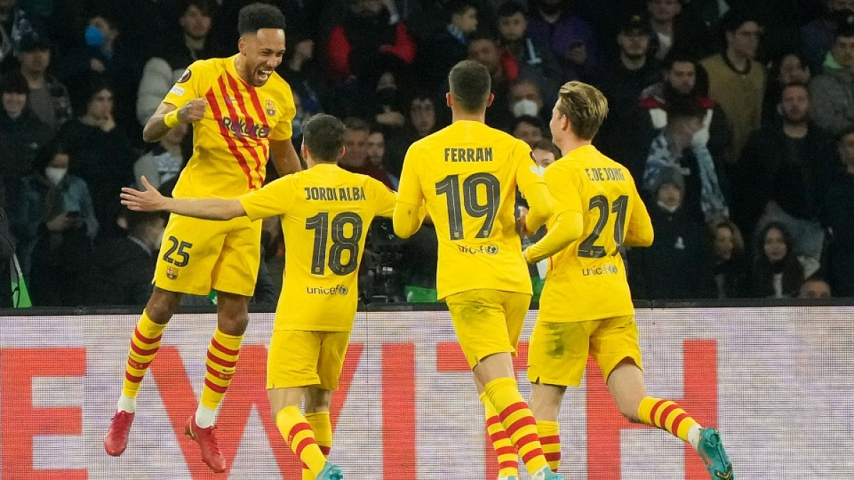 Barcelona's Pierre-Emerick Aubameyang (L) celebrates after scoring against Napoli in Europa League.