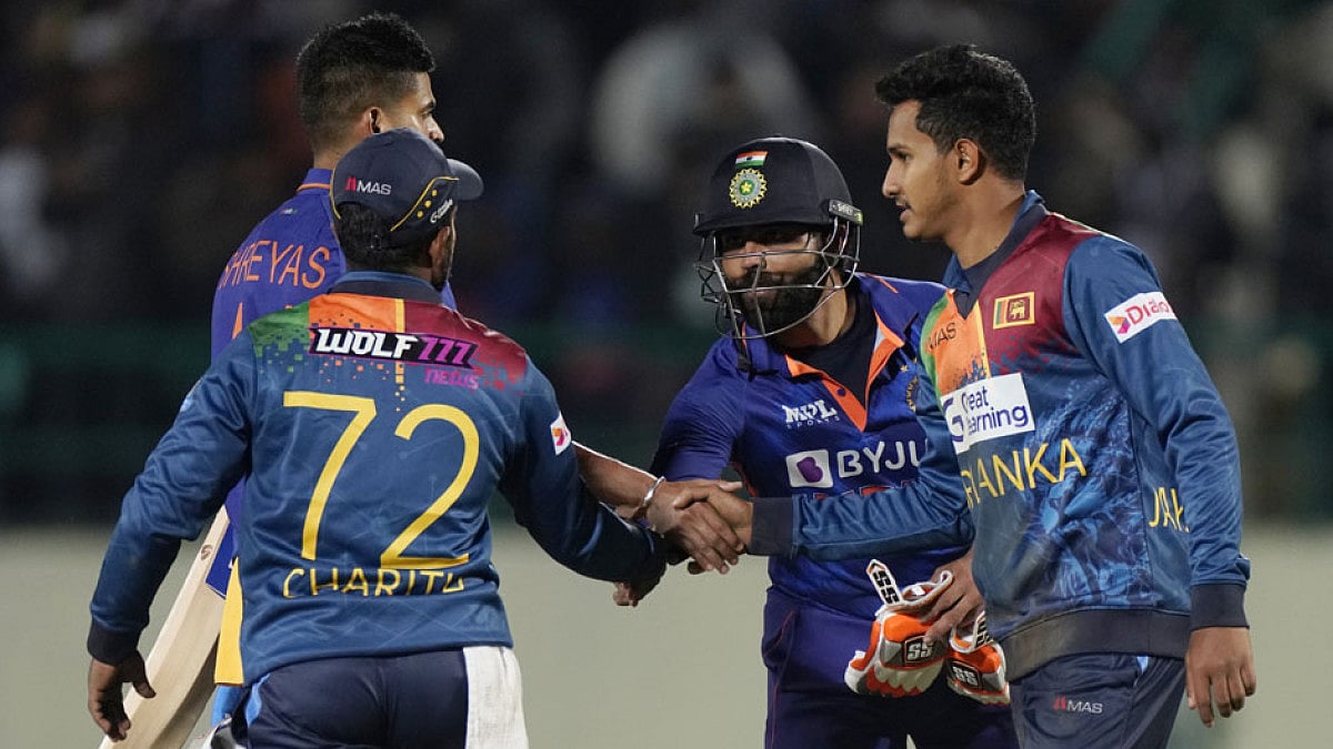 Sri Lankan players congratulate India's Ravindra Jadeja after the end of 2nd T20I in Dharmsala.