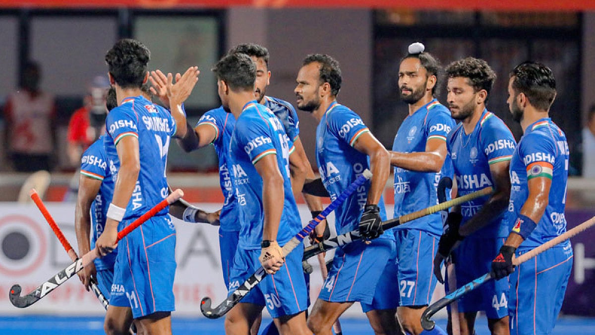 India hockey players celebrate a goal against Spain in their FIH Pro League match.