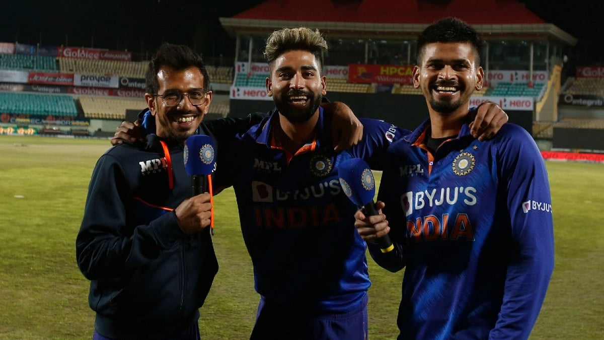 Yuzvendra Chahal, Mohammad Siraj and Shreyas Iyer share a laugh after India's T20 series win. 
