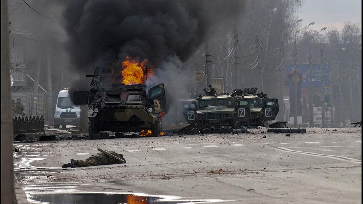 A Russian armored carrier burns after fighting in Kharkiv, Ukraine.