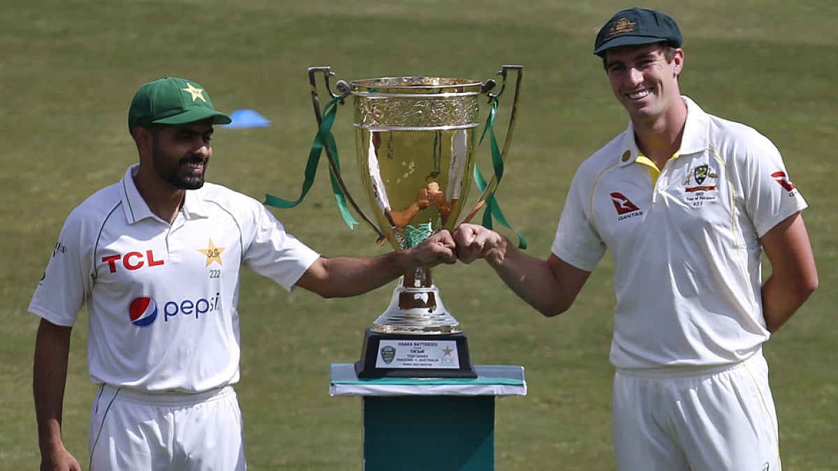 Captains Babar Azam and Pat Cummins with the Benaud-Qadir Trophy in Rawalpindi on Tuesday.