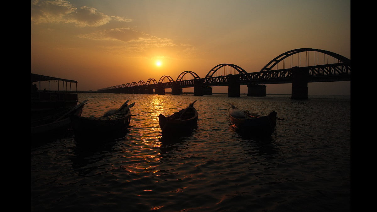 The sun sets over the Godavari Arch Bridge in Rajahmundry