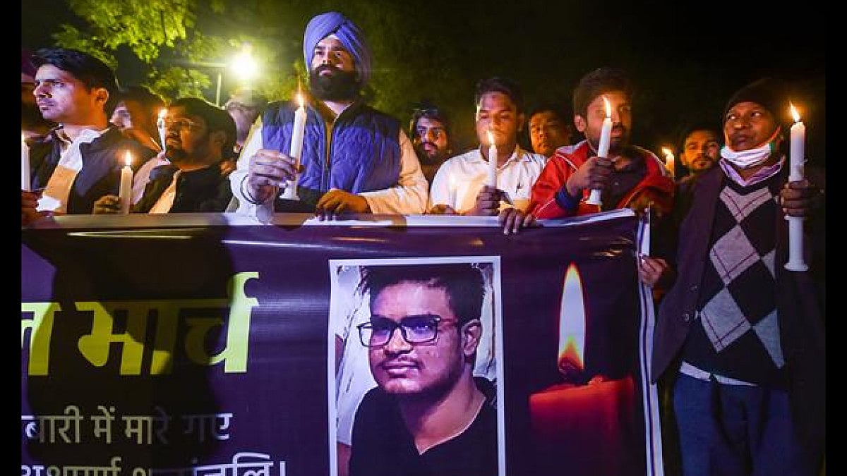 Members of the Congress during a candle march in memory of Naveen Shekharappa.