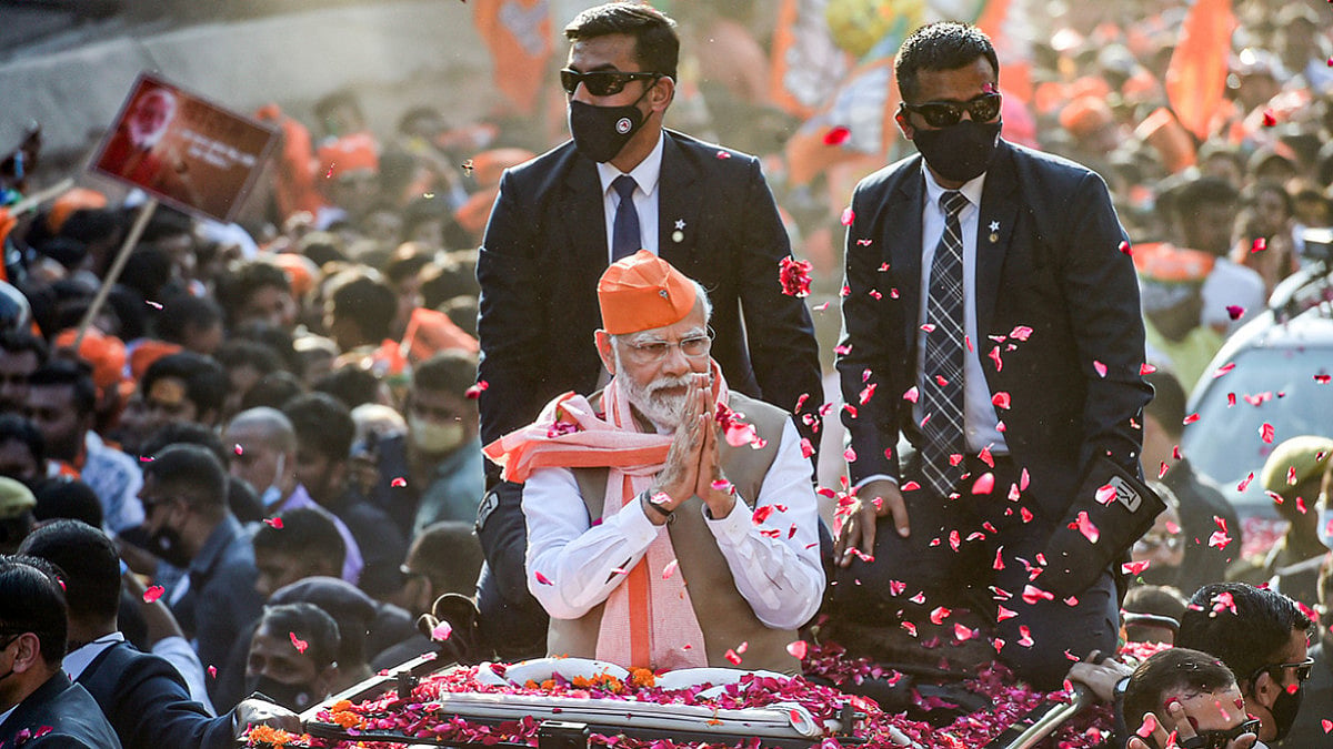 PM Modi campaigning in Uttar Pradesh at a road show in Varanasi ahead of the seventh and last phase