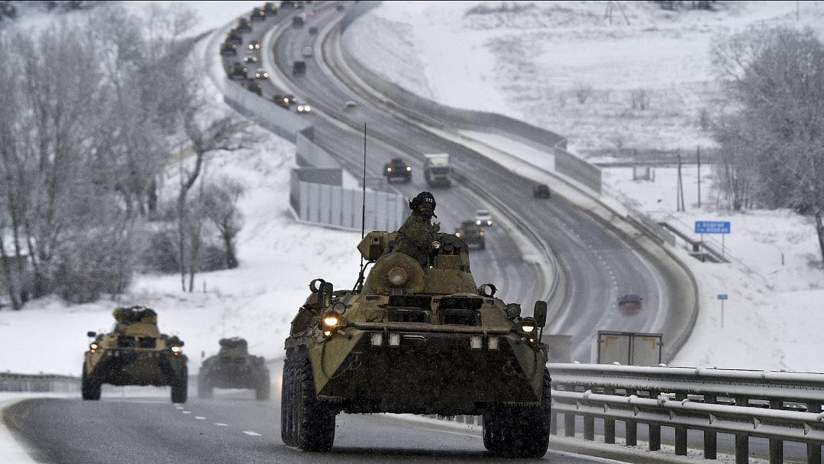 Military cars on the road in Ukraine. 