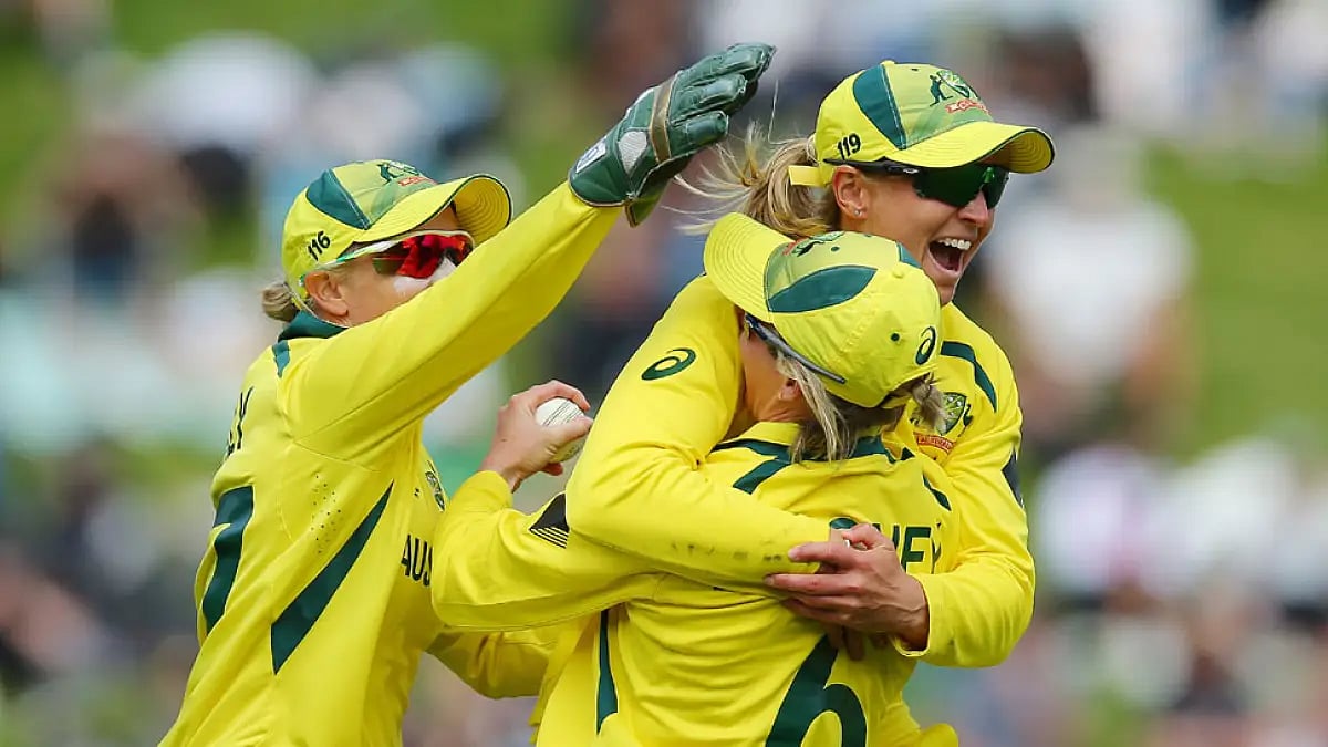 Australian cricketers celebrate during their Women's ODI World Cup match against New Zealand.