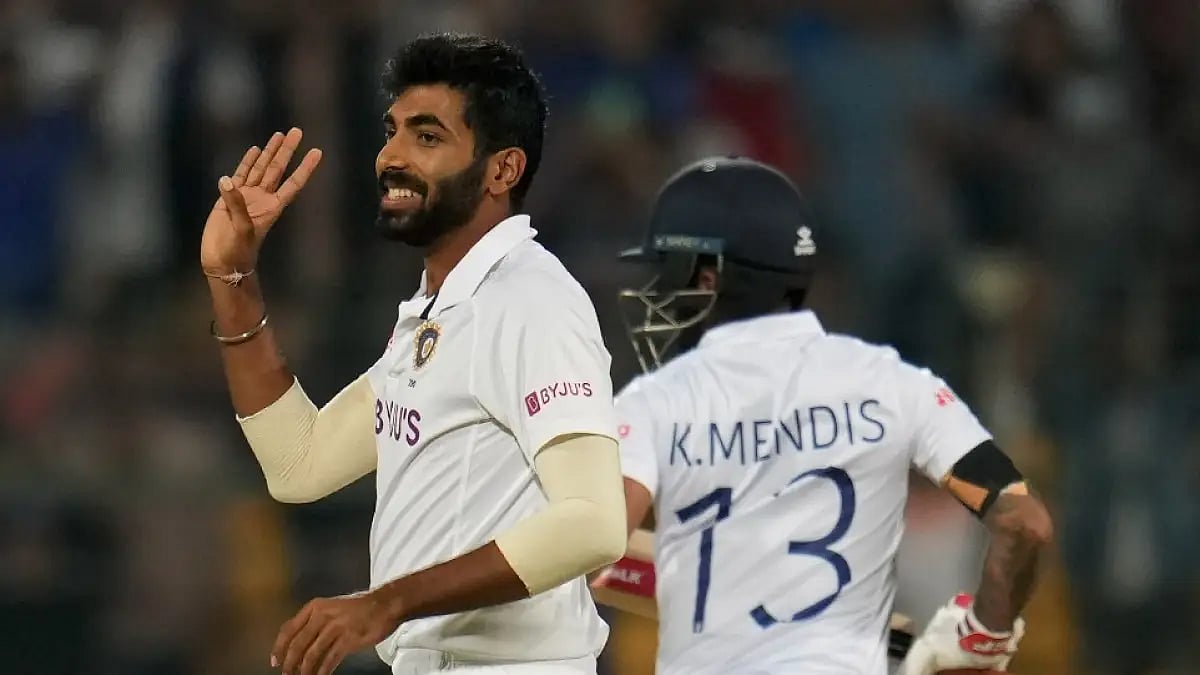 Jasprit Bumrah celebrates after dismissing Lahiru Thirimmane on Day 2. Get highlights of IND vs SL. 