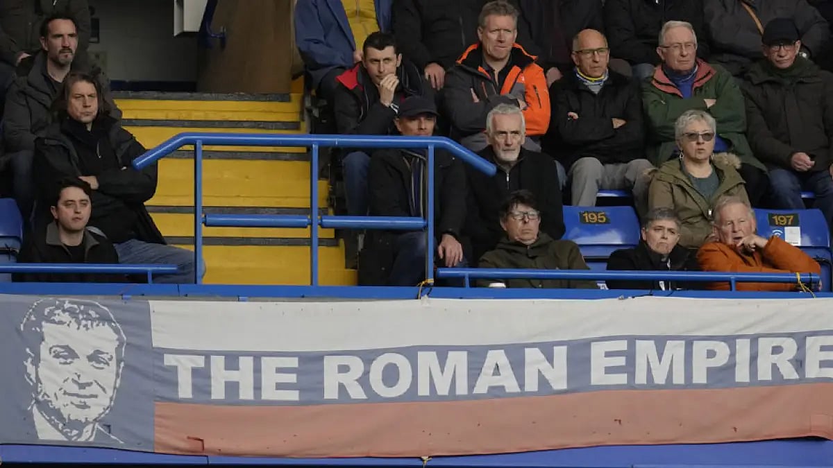 A banner in the colors of Russia's national flag depicts Chelsea club owner Roman Abramovich.