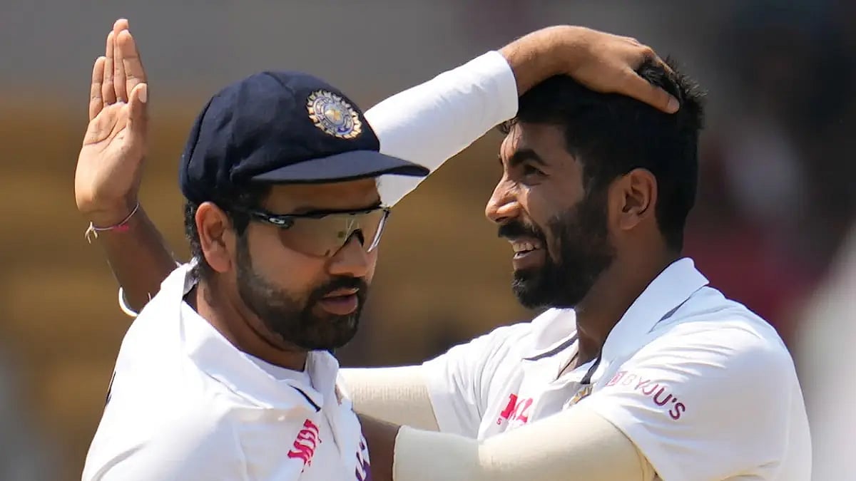 Rohit Sharma congratulates Jasprit Bumrah after the latter took a wicket against Sri Lanka.  