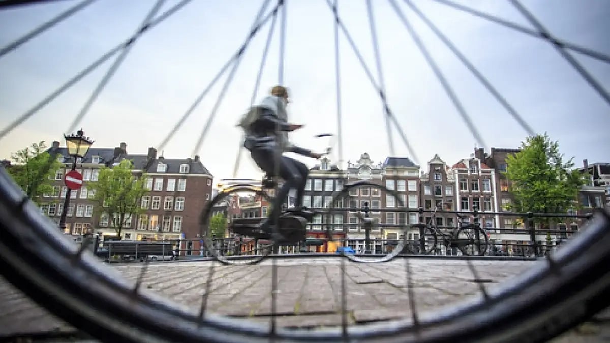 Riding a bicycle is an essential Amsterdam experience  