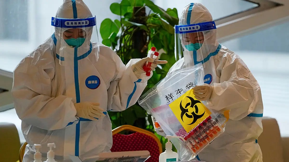 Representative image of health experts dressed in PEP kit.