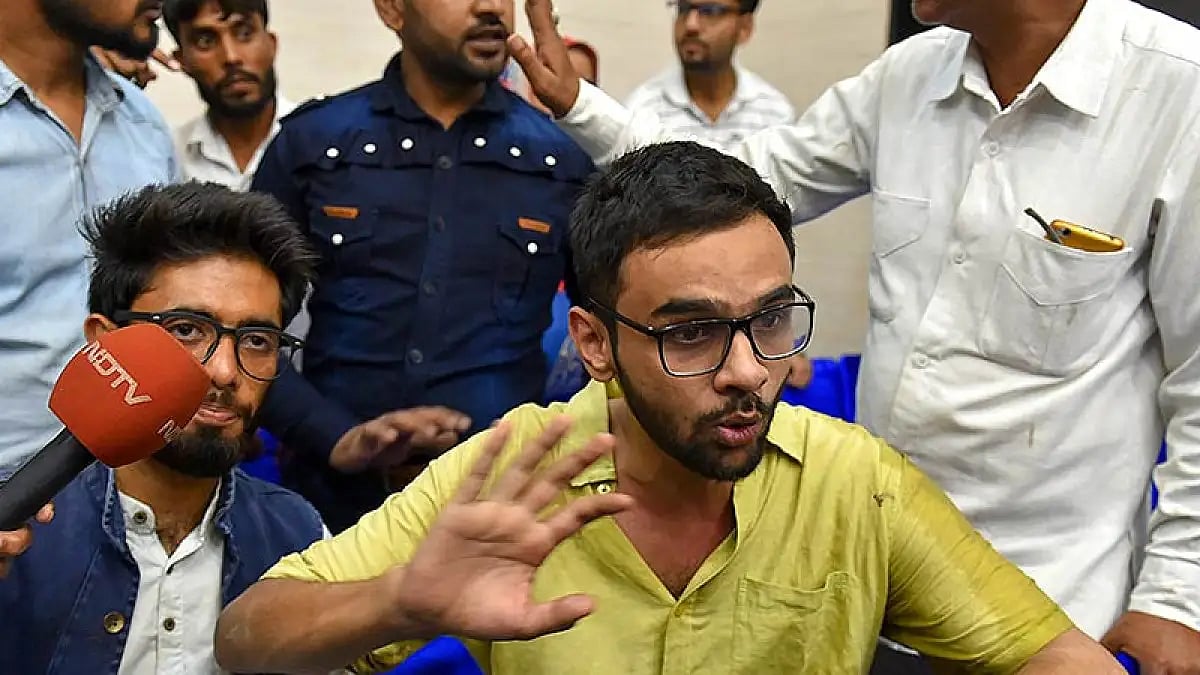  JNU student Umar Khalid speaks to the media moments after he was shot at, during an event 