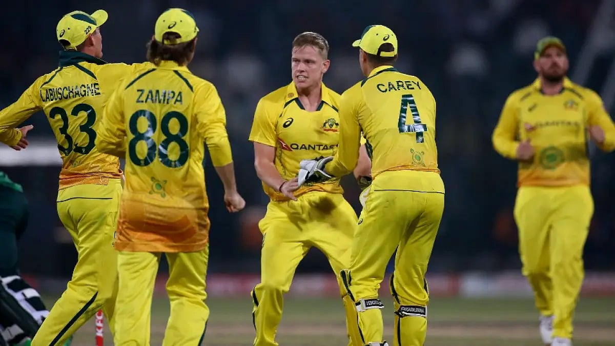Australia players celebrate the fall of a Pakistan wicket in the first ODI in Lahore.  