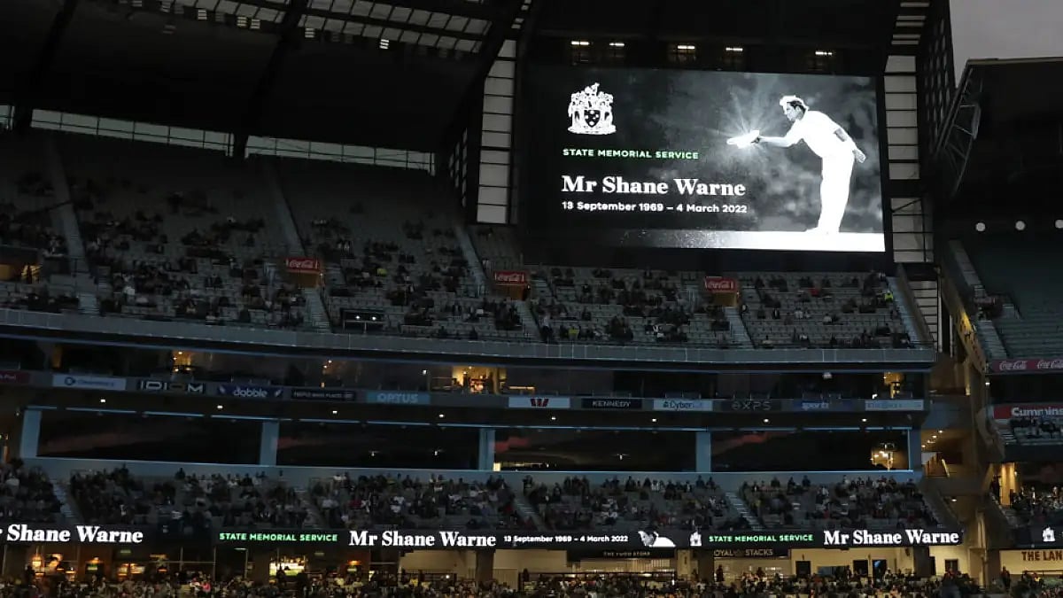 A photo of Shane Warne is projected onto screens during a memorial service at MCG on March 30, 2022.