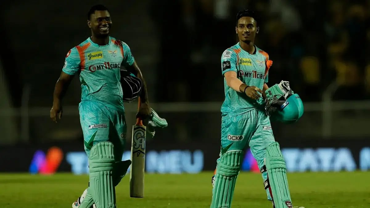 Ayush Badoni (R) and Evin Lewis leave the field after guiding LSG to win against CSK in IPL 2022.