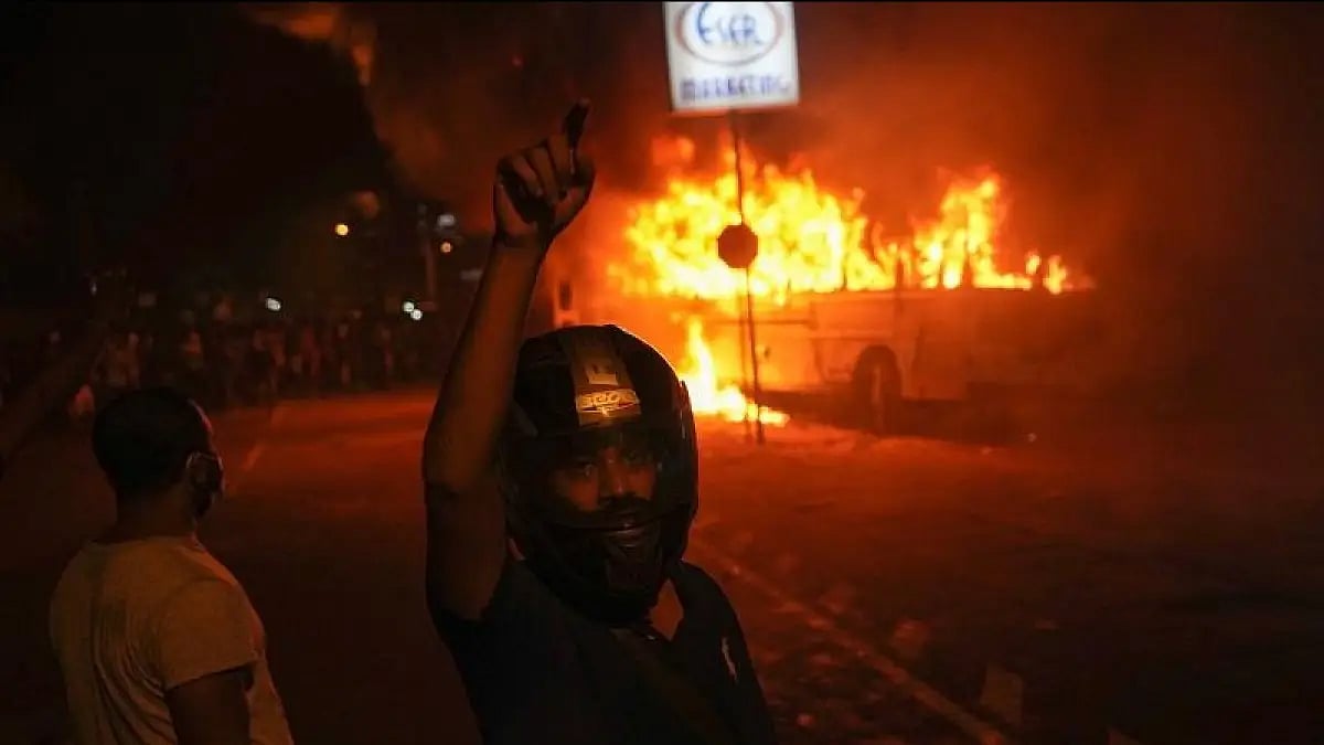 A vehicle burnt during the protest