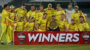 Australian players celebrate with the winners' trophy after beating Pakistan in one-off T20.
