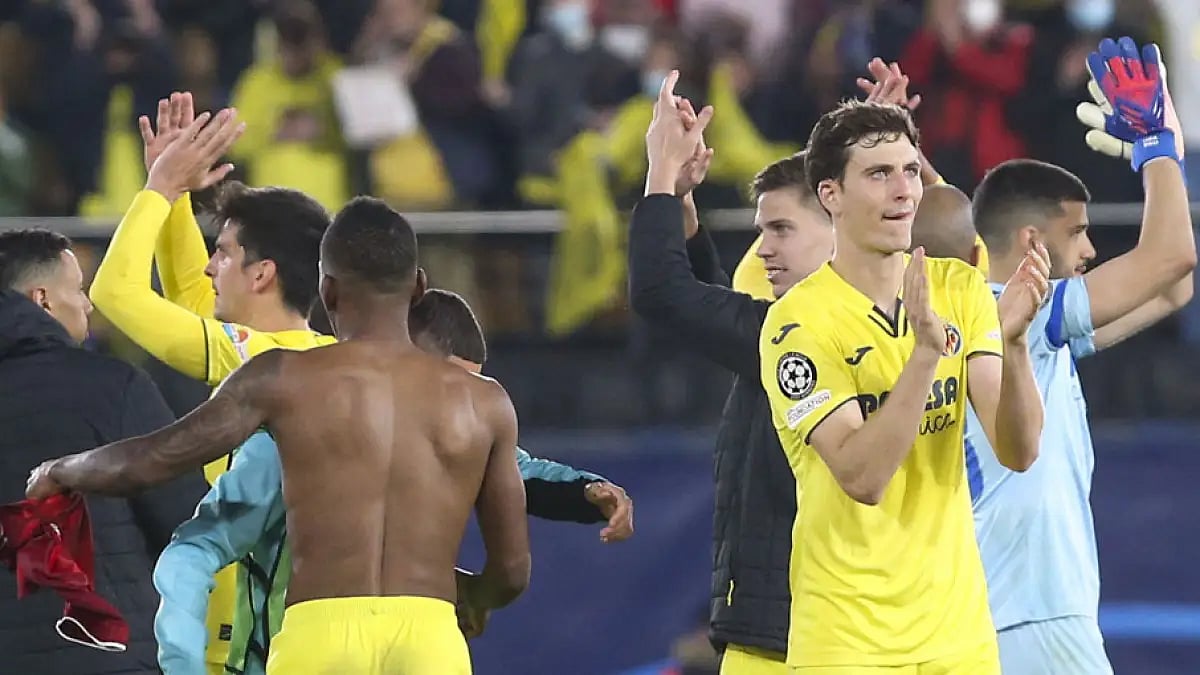 Villarreal players applaud at the end of their Champions League match against Bayern Munich.