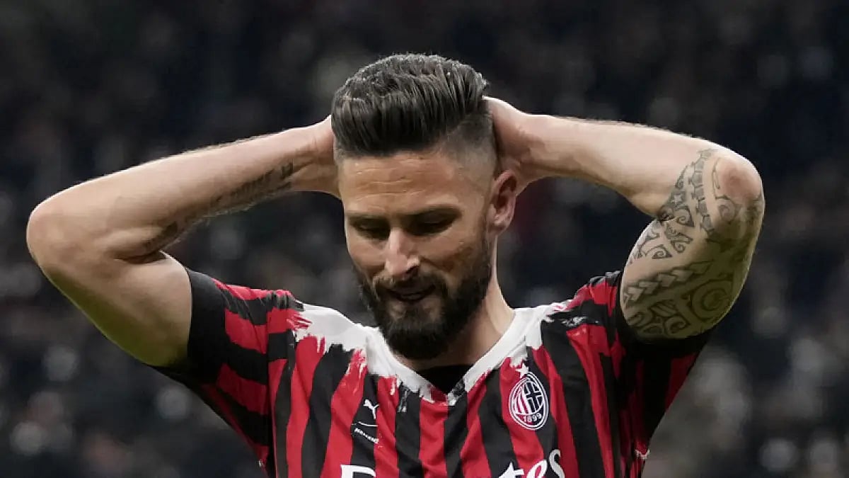 AC Milan's Olivier Giroud reacts during their Serie A match against Bologna.