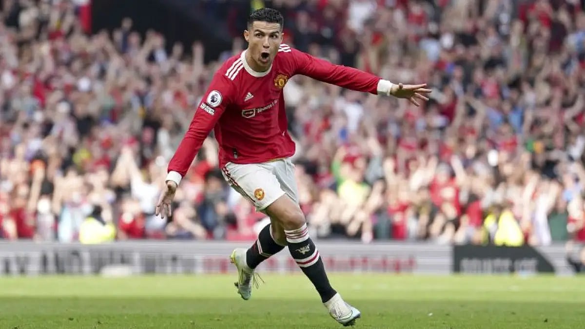 Manchester United's Cristiano Ronaldo celebrates his third goal against Norwich City on Saturday.