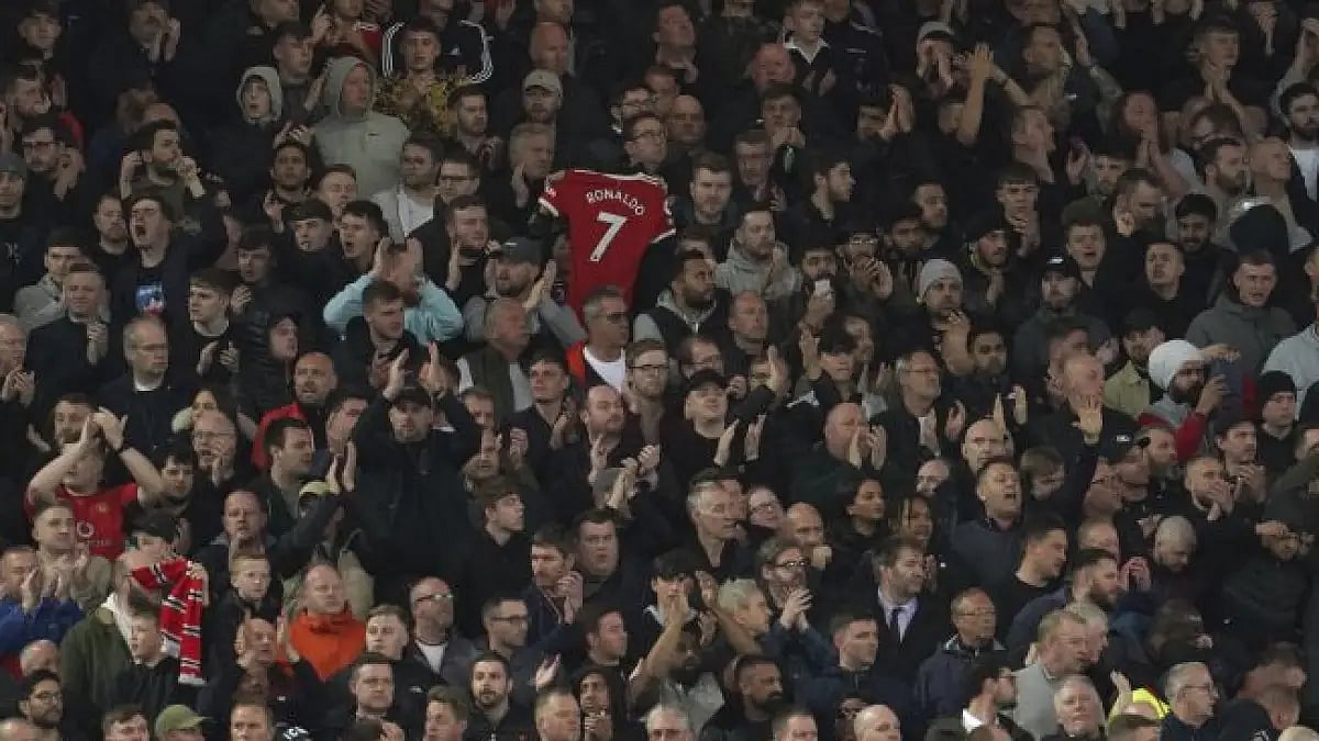 Liverpool fans applaud in support for Cristiano Ronaldo and his family during EPL game on Tuesday.