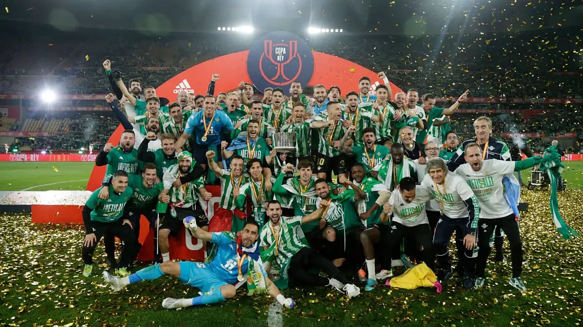 Real Betis players celebrate after winning the Copa del Rey 2021-22.  