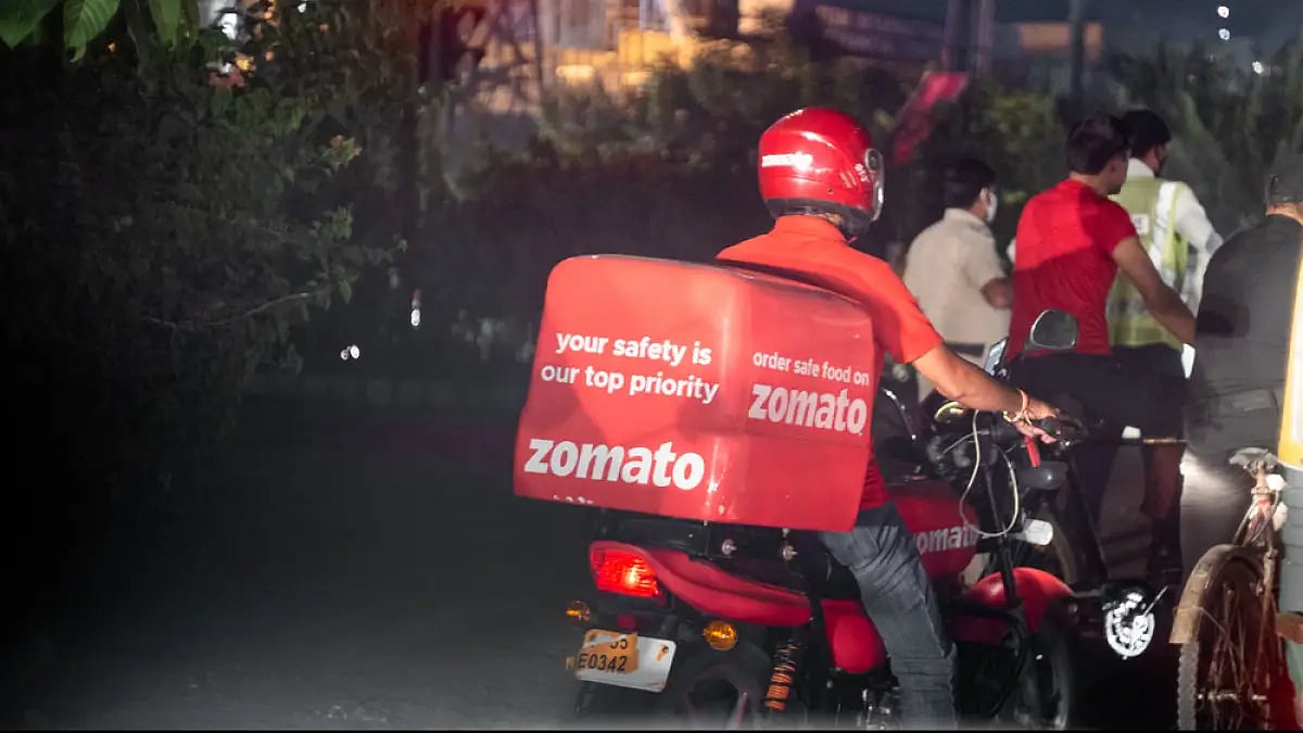 Zomato food delivery rider on his way to deliver an order