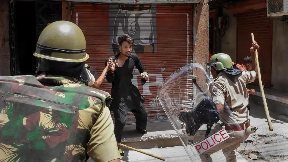 Police charging an alleged miscreant at Jalori Gate in Jodhpur, Rajasthan, on Tuesday