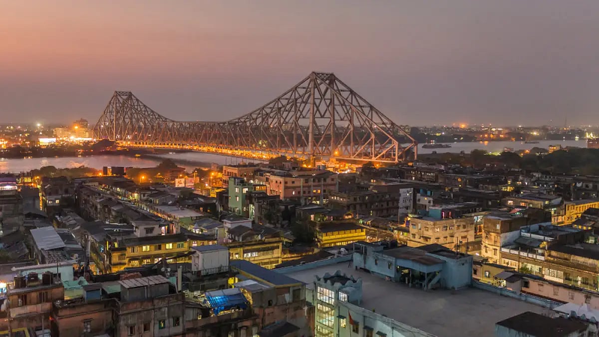 A lit up Howrah Bridge over the Hooghly