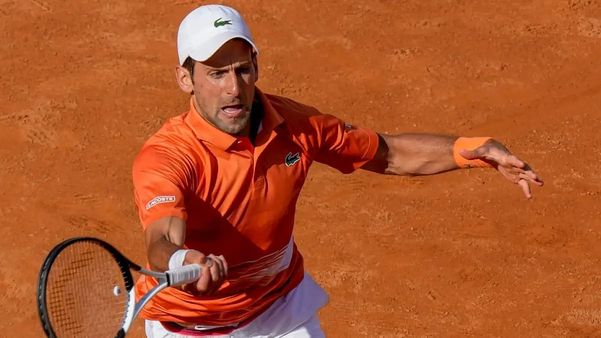 Novak Djokovic in action against Aslan Karatsev during their match at Italian Open 2022.