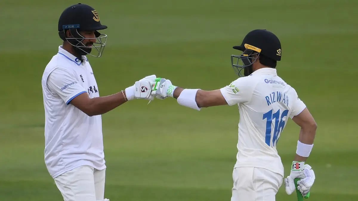 Cheteshwar Pujara and Mohammad Rizwan shared a 154-run stand against Durham for Sussex.  
