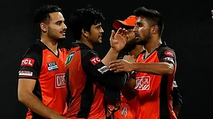 Umran Malik (right) continues to impress with his bowling. He picked three wickets in MI vs SRH, IPL