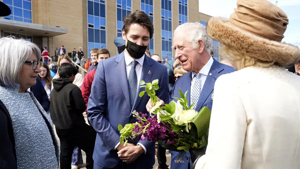 Prince Charles and Camilla, Duchess of Cornwall greet Canada's Gov.-Gen. Mary Simon as Prime Minister Justin Trudeau looks on, in St. John's, May 17, 2022.
