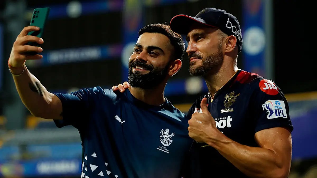 Virat Kohli and Faf du Plessis click a selfie after RCB's win. Get highlights of RCB vs GT.  