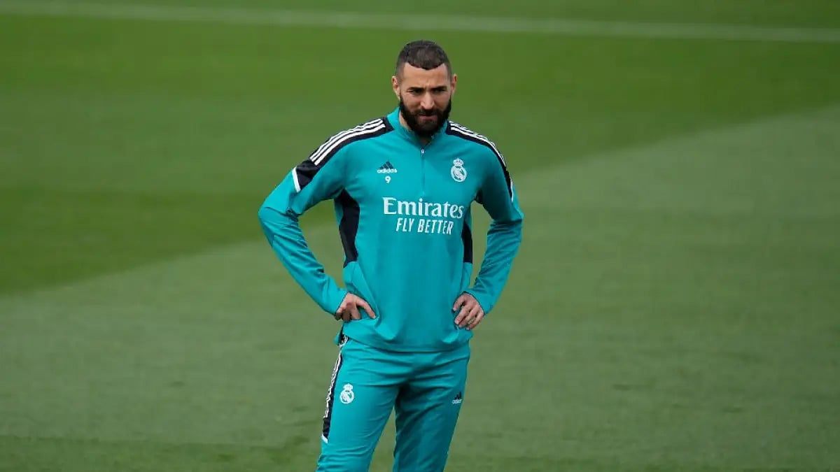 Real Madrid's Karim Benzema stands on the pitch during a training session on Tuesday.
