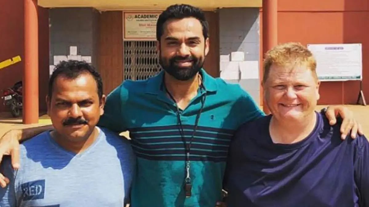 Abhay Deol, middle, who plays the role of Rudrakesh Jena in the movie, with Paul Walsh, left.