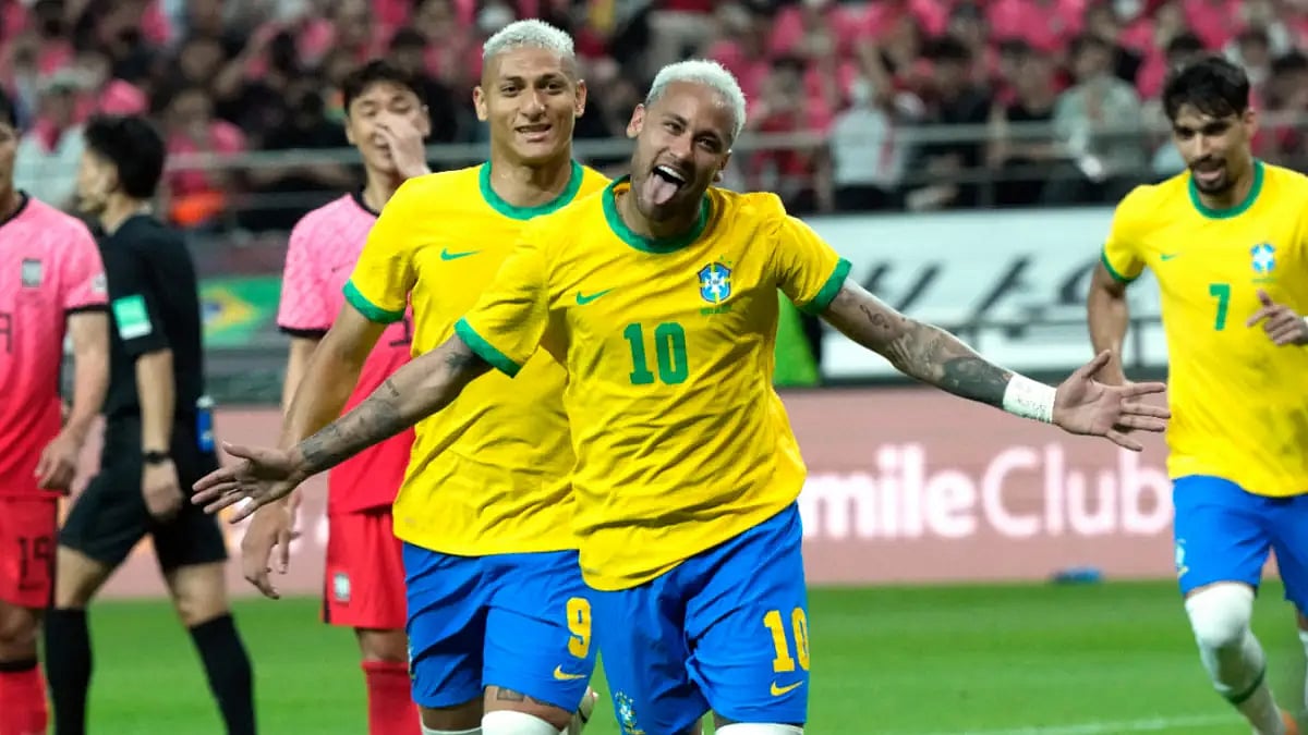Neymar reacts after scoring during a friendly match against South Korea at Seoul World Cup Stadium.