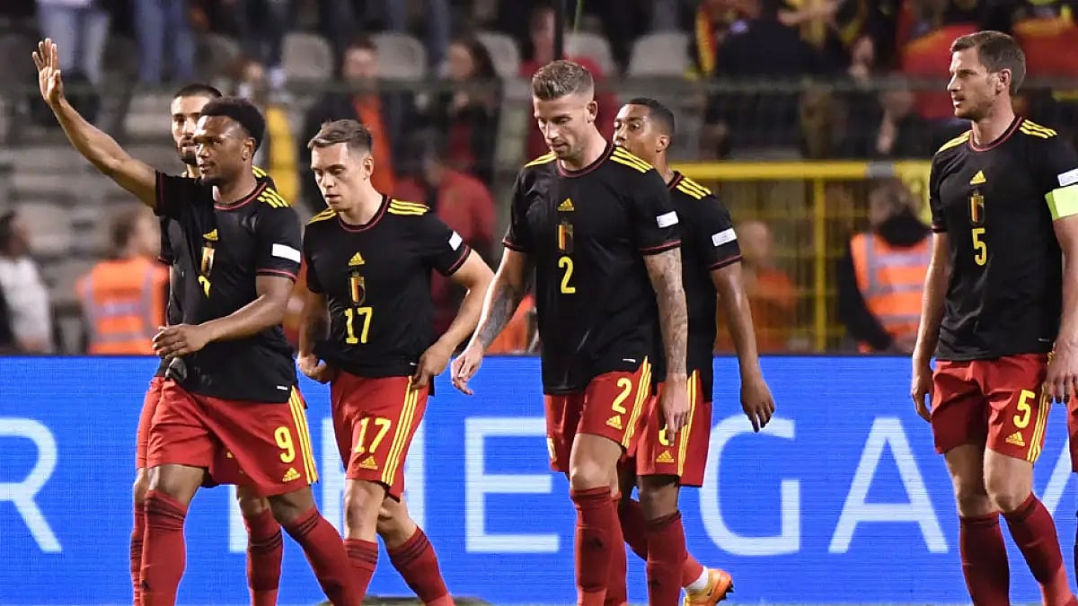 Belgium's Lois Openda, left, celebrates after scoring against Poland during their UEFA Nations League match in Brussels, June 8, 2022.