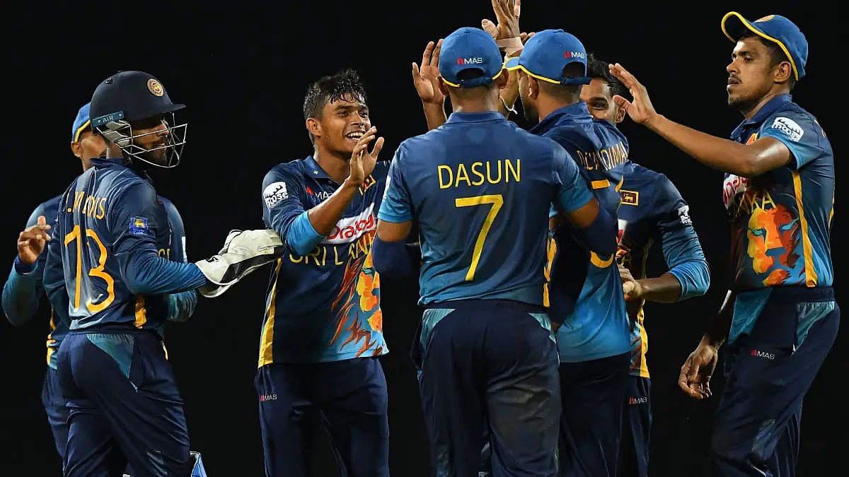 Sri Lanka players celebrate an Australian wicket in the second ODI.   