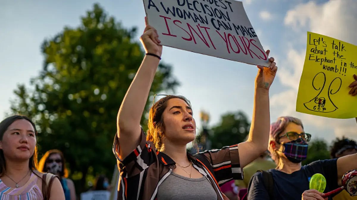 Demonstrators protest in front of the SC building in Washington, DC on June 25, 2022 