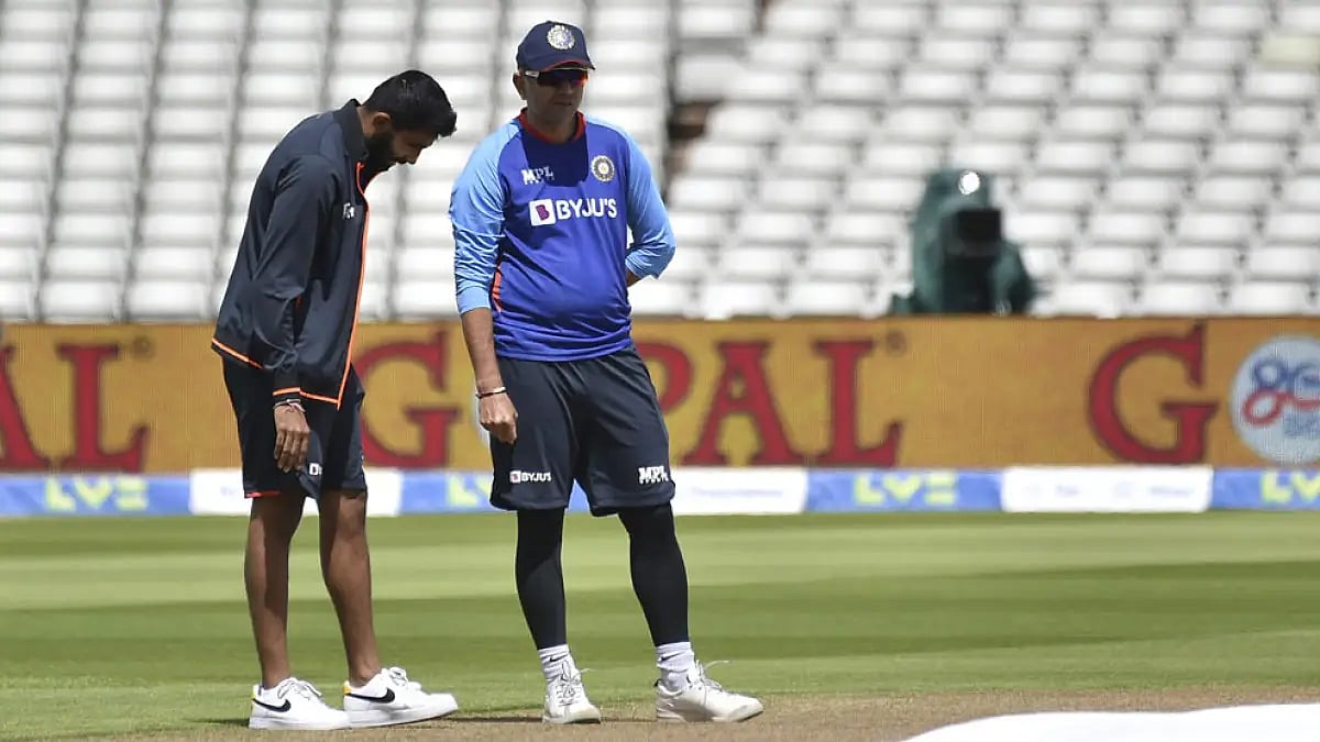 Jasprit Bumrah, left, Rahul Dravid inspect the pitch at Edgbaston. Watch ENG vs IND 5th Test live.